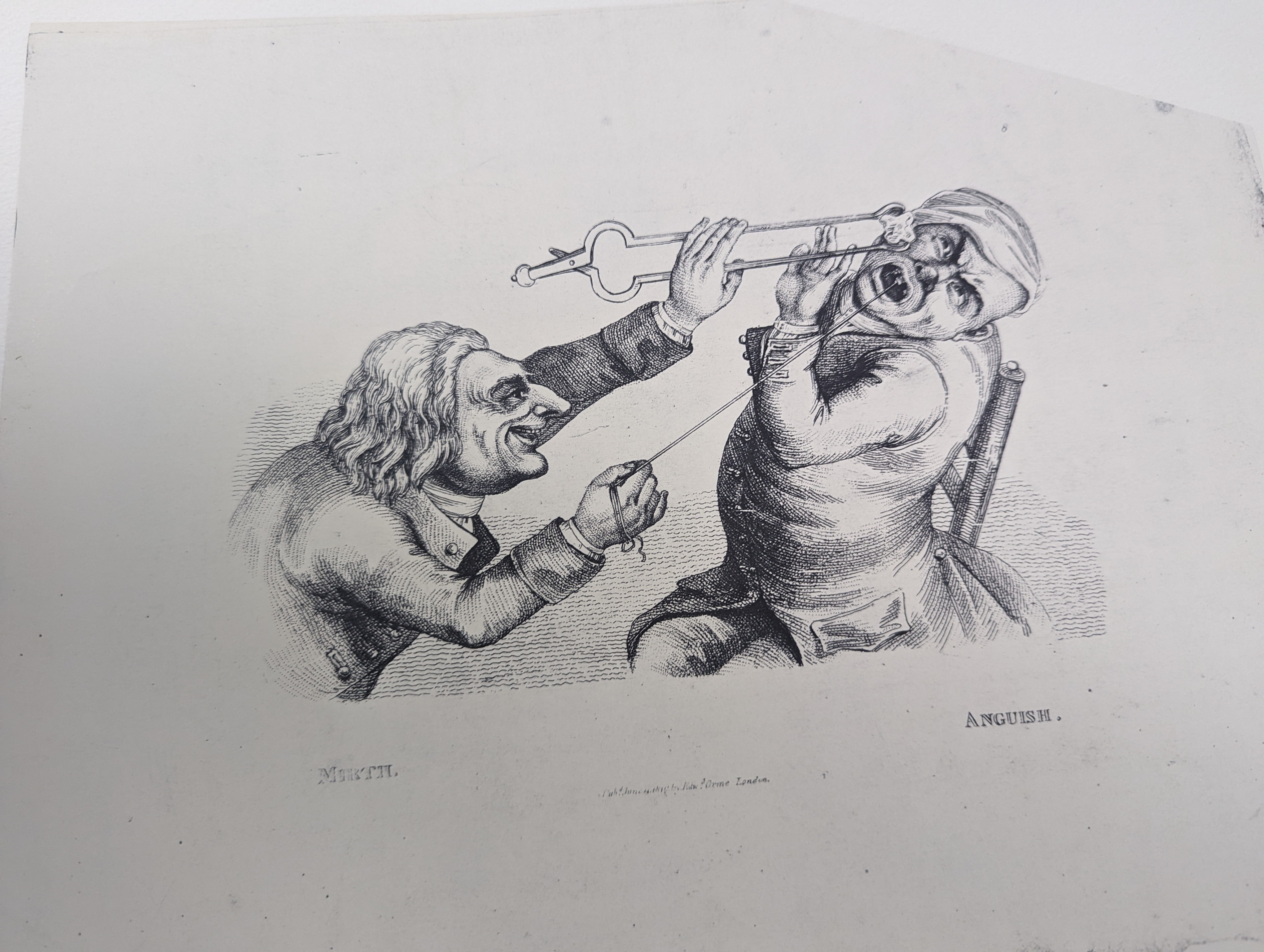 George Moutard Woodward (1760-1809) - ‘’Metallic Traitors. Pro Bono. Publico’’, a caricature of dentists extracting teeth, charcoal and red chalk, inscribed, 28 x 27.5cms; together with five other drawings and prints rel